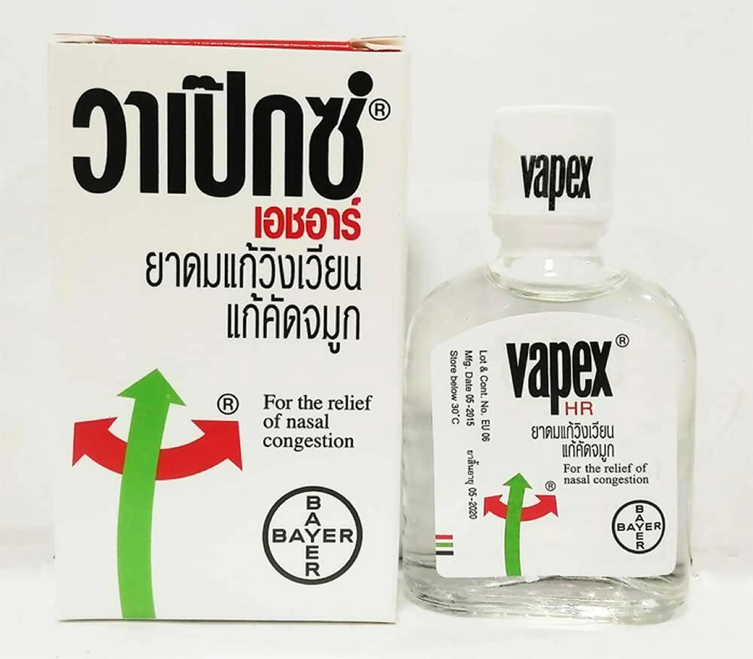 Флакон капель для носа Vapex на фоне упаковки. Средство для облегчения заложенности носа.