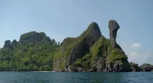 Scenic view of limestone cliffs covered in greenery in Phuket, Thailand.