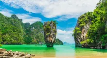 Beautiful turquoise waters and limestone cliffs in Phuket's scenic bay. Ideal tropical paradise.