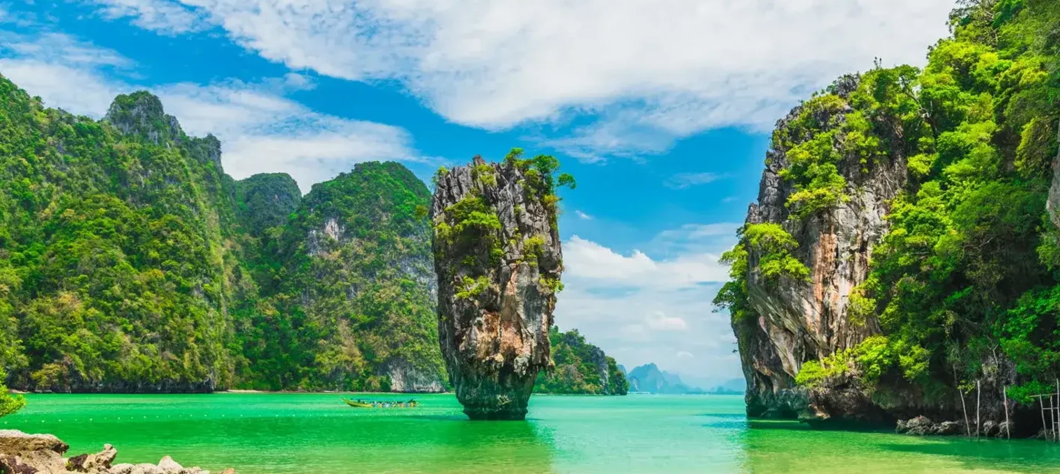 Beautiful turquoise waters and limestone cliffs in Phuket's scenic bay. Ideal tropical paradise.